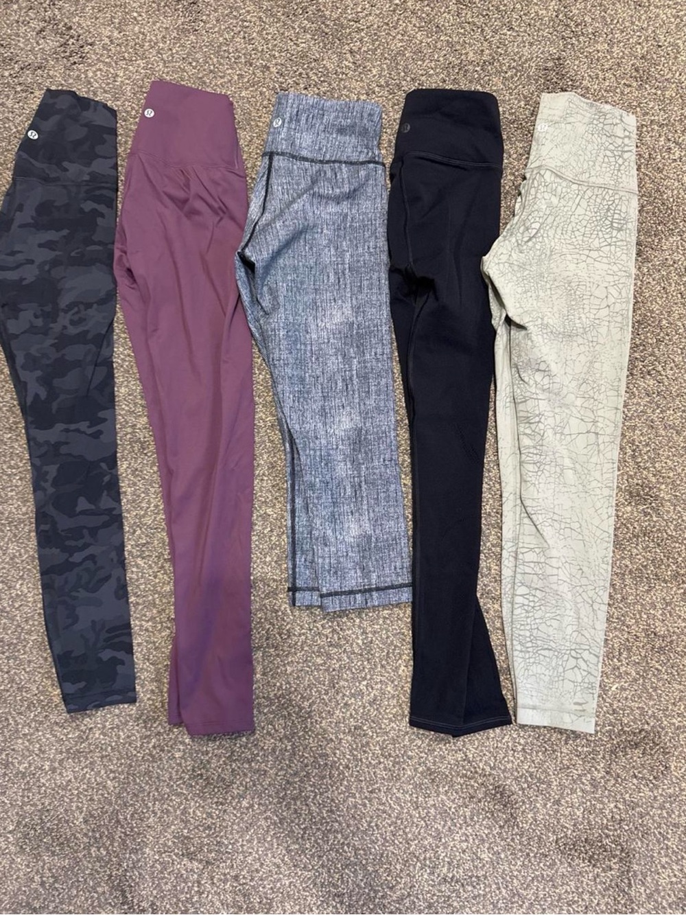 Lululemon bundle of 5 leggings in various colors and lengths.